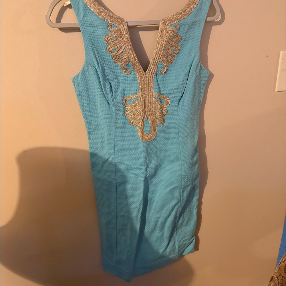 Turquoise Dress with Gold Embellishments
